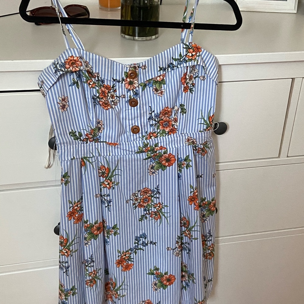 Dress with floral details